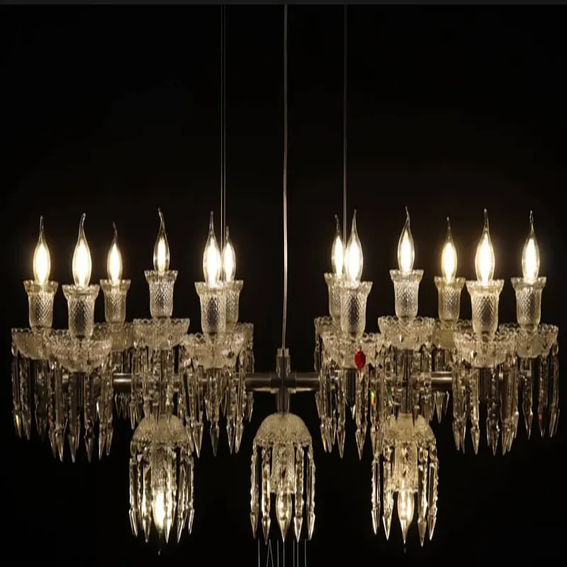 تصویر لوستر جزیره زنیت با طراحی خطی مدرن بر روی جزیره آشپزخانه سفید