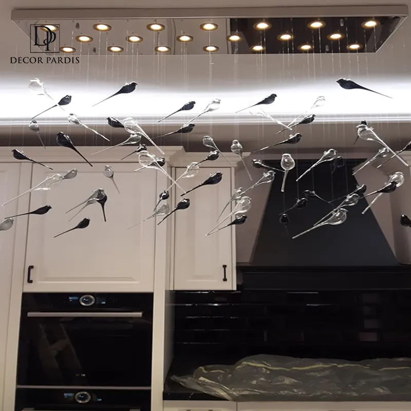 لوستر دست ساز بال فرشته مدل کریستال هالوژن دار با نور لوکس و درخشان