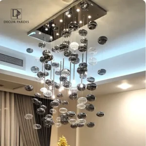 لوستر دست ساز مدل عدسی با طراحی هندسی و نور یکنواخت