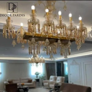 لوستر جزیره زنیت با طراحی خطی مدرن بر روی جزیره آشپزخانه سفید