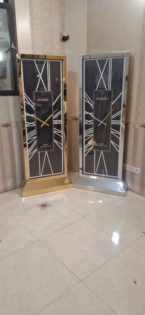 تصویر ساعت ایستاده استیل دو رنگ سیلور و طلایی